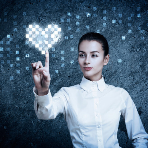 Woman Pointing at Glowing Digital Heart